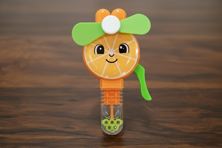 Handheld Fruit Shape Toy Fan for Kids – Cute Cartoon Design, Safe Soft Blades, Portable Mini Fan for Summer Play & Cooling (Random Design)