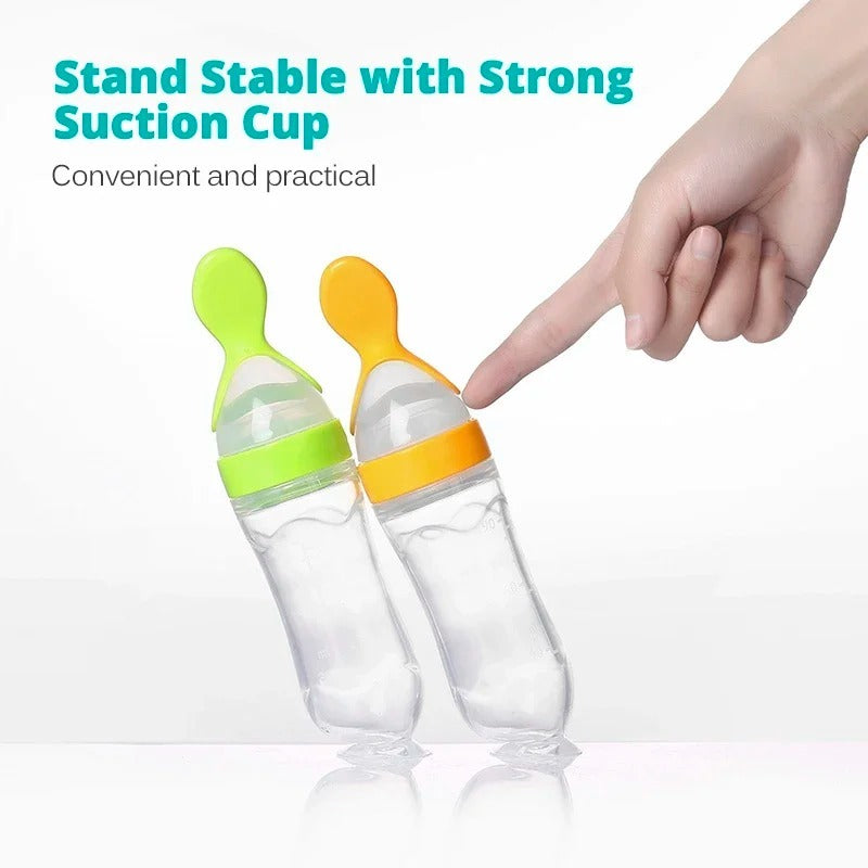 Silicone Baby Spoon Squeezing Feeding Bottle Feeder – Soft, Safe & Easy Baby Food Dispenser (Random color)